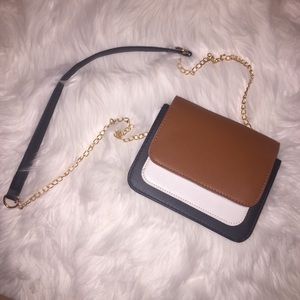 Small brown white and black crossbody purse